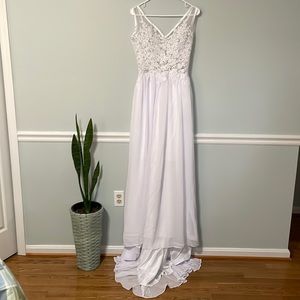 Never worn simple white lace wedding dress. Size small